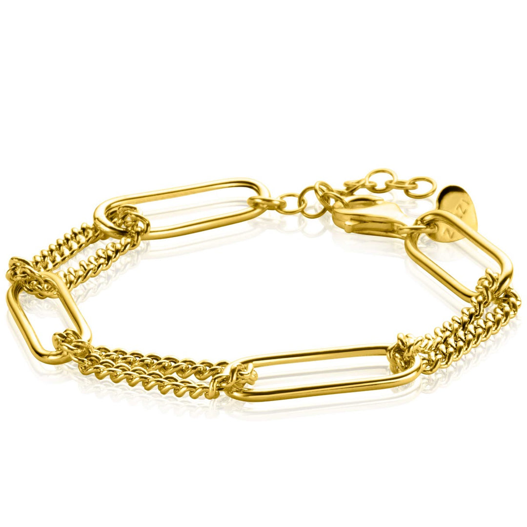 De Zinzi Armband Gold Plated Zia2382 heeft een kettingontwerp met grote, langwerpige schakels en kleinere schakeldelen, allemaal voorzien van een sluiting, waardoor stijl en elegantie op prachtige wijze samenkomen.