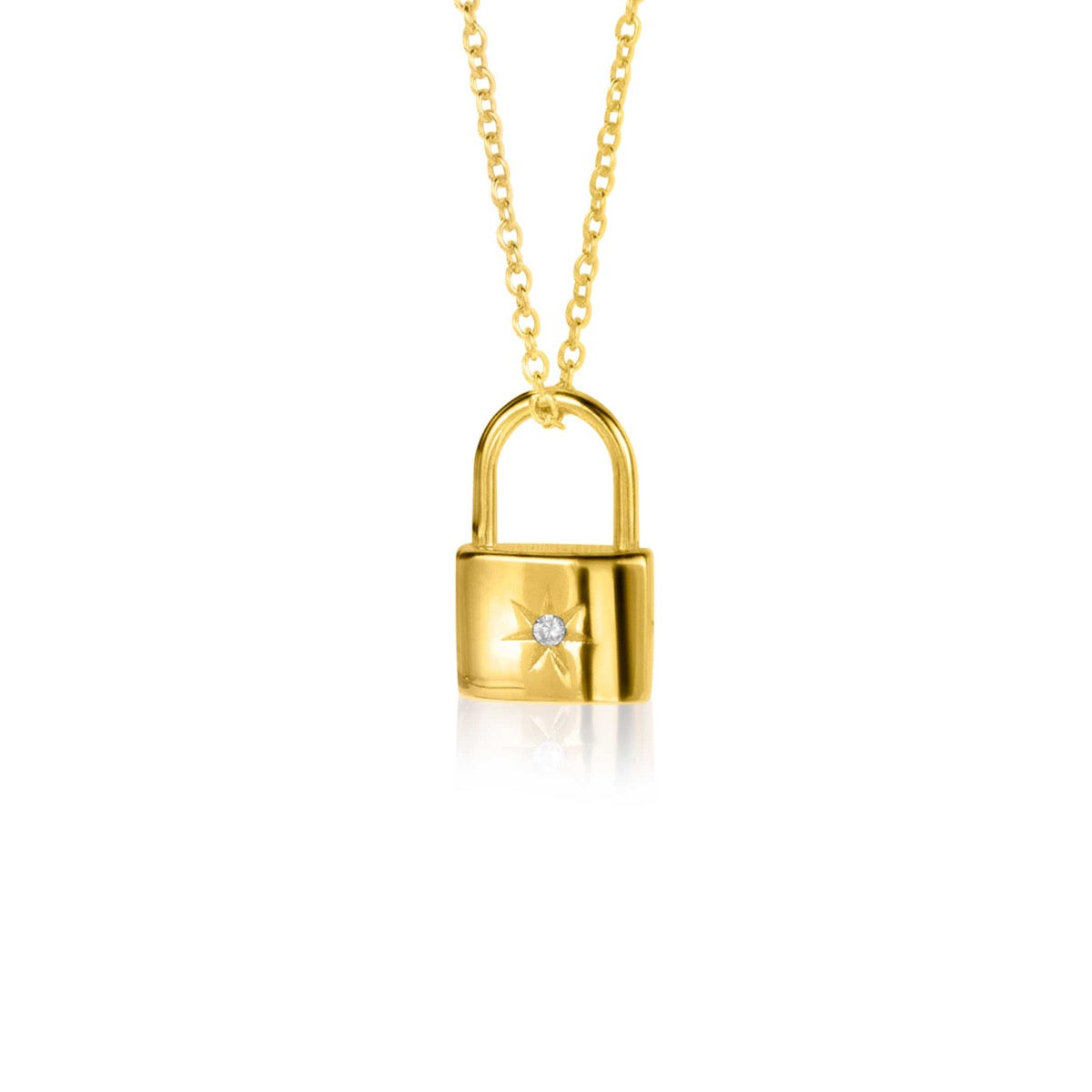 Goldplattierter Anhänger in Form eines Schlosses mit einem kleinen Edelstein und feiner Kette