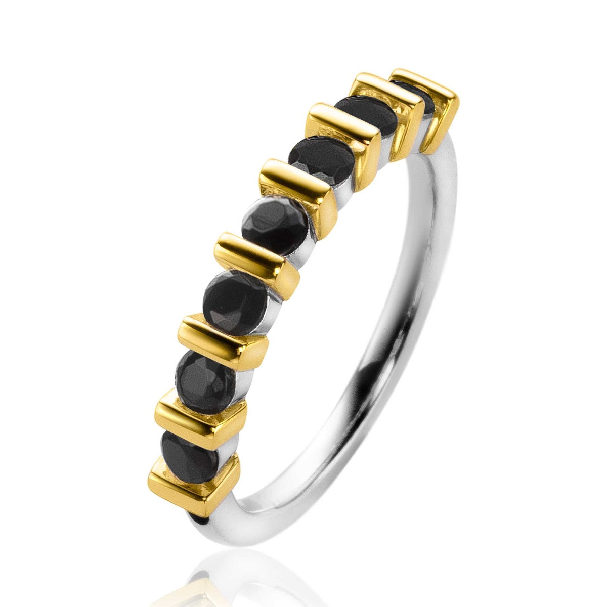 Ring mit goldplattierten Elementen und schwarzen Edelsteinen in einer modernen Anordnung